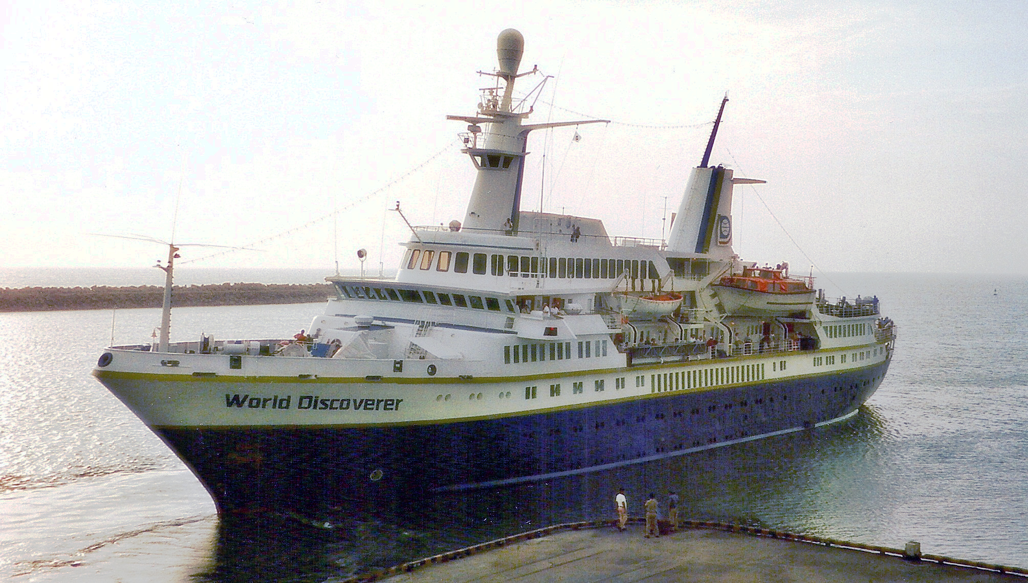 Cruise ship “World Discoverer” docked at calm harbor