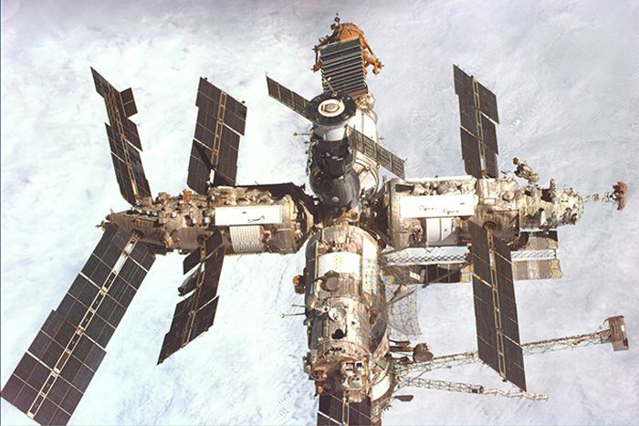 Space station with solar panels orbiting Earth